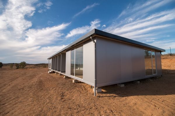 Mobile office house on a dirt field